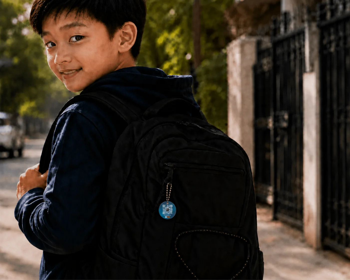 EkTag QR luggage tag on a school backpack for kids and students